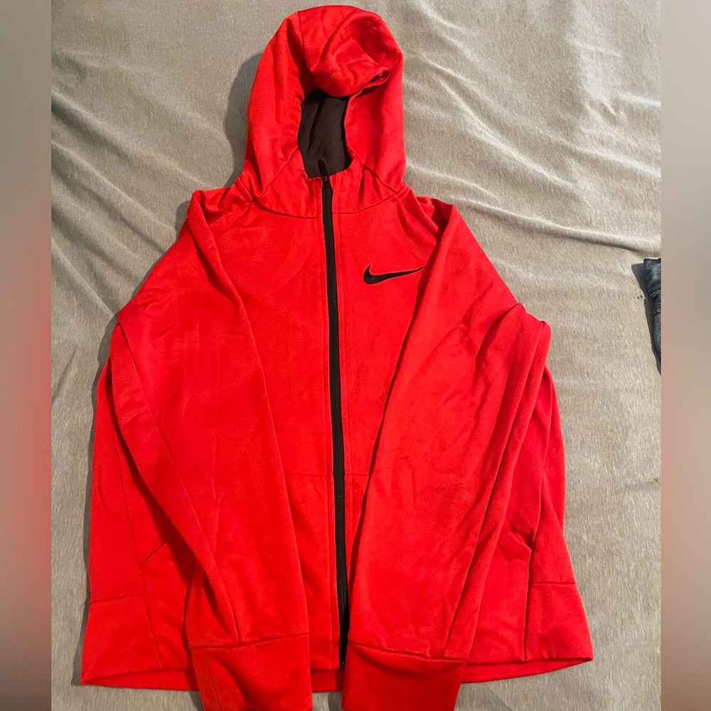 Red Nike Dry fit hoodie.